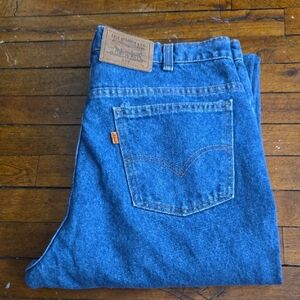 Vintage Leviś 619 Faded Medium Wash  Jeans With Leather Patch  Label /34 Waist